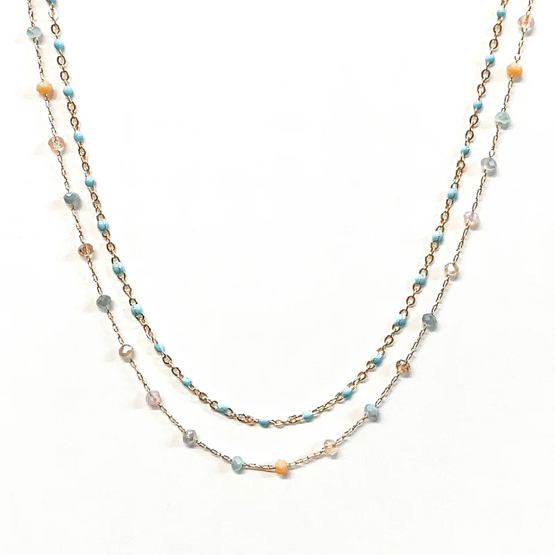 Designer Necklace-Two Strand Gold Chain Necklace with Bead Spacers in Baby Blue Multi